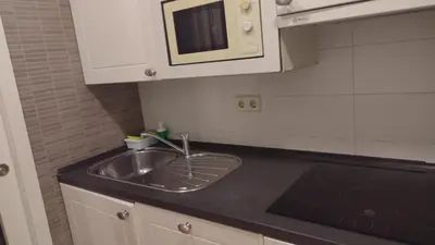Una cocina o zona de cocina en Amplio y céntrico apartamento en La Latina