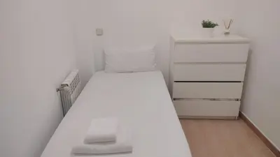 Cama o camas de una habitación en Amplio y céntrico apartamento en La Latina