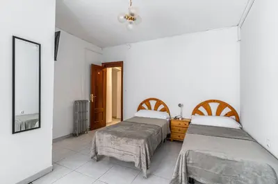Cama o camas de una habitación en Hostal Marie Del Mar