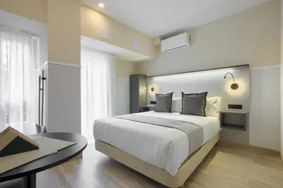 Cama o camas de una habitación en Dobo Madrid CV93