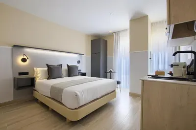 Cama o camas de una habitación en Dobo Madrid CV93