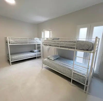 Cama o camas de una habitación en Hostel Vallecas