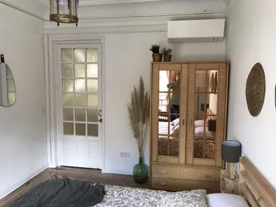 Cama o camas de una habitación en PRECIOSO APARTAMENTO en el EL CENTRO DE MADRID