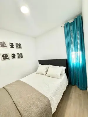 Cama o camas de una habitación en Metro Avenida de America 04 AMCH Hospedaje