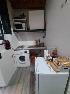 Una cocina o zona de cocina en Estudio céntrico