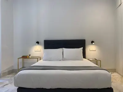 Cama o camas de una habitación en Lovely 3BR near Palacio Real