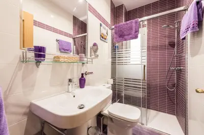Un baño de Apartamentos Madrid XXXIII - Alojamiento de Temporada