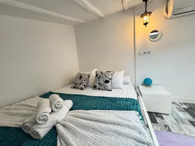 Cama o camas de una habitación en Loft Som Centro Temporal