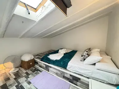 Cama o camas de una habitación en Loft Som Centro Temporal