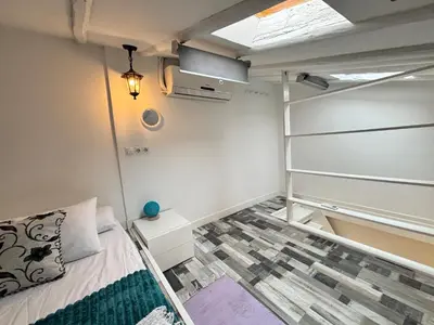 Cama o camas de una habitación en Loft Som Centro Temporal