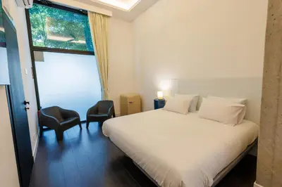 Cama o camas de una habitación en WE MADRID STUDIOS centro