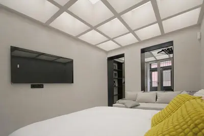 Cama o camas de una habitación en Atelier Malasaña