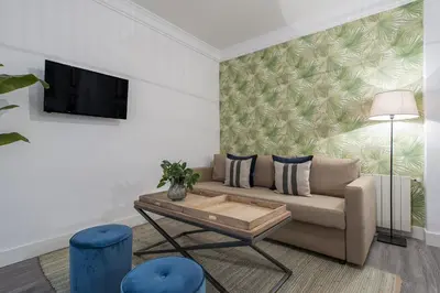Una televisión o centro de entretenimiento en Chamberi Boutique Zurbano - AH