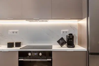 Una cocina o zona de cocina en Waou Essence VI Antón Martín - Corta Duración
