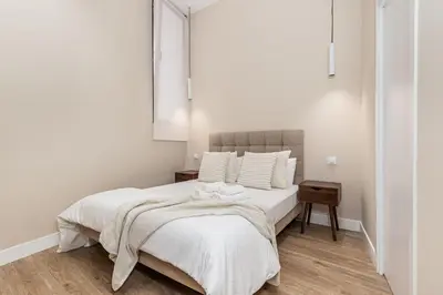 Cama o camas de una habitación en Waou Essence VI Antón Martín - Corta Duración