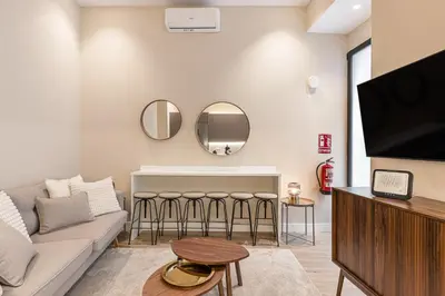Una televisión o centro de entretenimiento en Waou Essence VI Antón Martín - Corta Duración