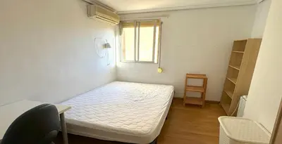 Cama o camas de una habitación en Piso de 3 dormitorios en el centro de Madrid
