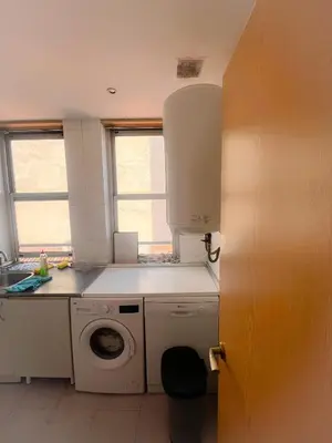 Una cocina o zona de cocina en Piso de 3 dormitorios en el centro de Madrid