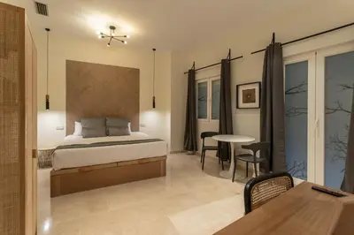 Cama o camas de una habitación en Suites You Opera