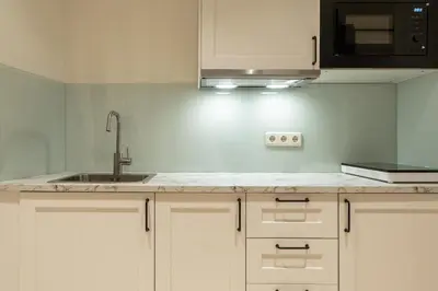 Una cocina o zona de cocina en Suites You Opera
