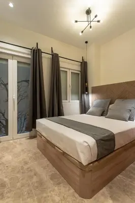 Cama o camas de una habitación en Suites You Opera