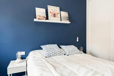 Cama o camas de una habitación en Spacious Bright-3Bedrooms 2Bathrooms-Av. America