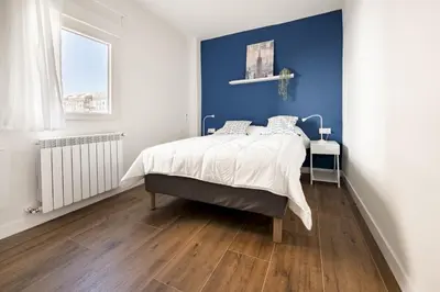 Cama o camas de una habitación en Spacious Bright-3Bedrooms 2Bathrooms-Av. America