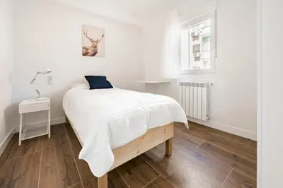 Cama o camas de una habitación en Spacious Bright-3Bedrooms 2Bathrooms-Av. America