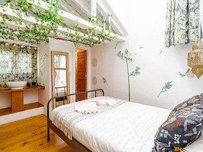 Cama o camas de una habitación en Palomar de Atocha