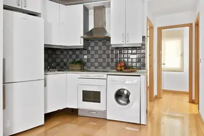 Una cocina o zona de cocina en Gran Vía Green Apartments