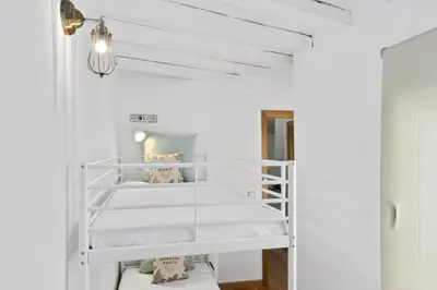 Cama o camas de una habitación en Gran Vía Green Apartments