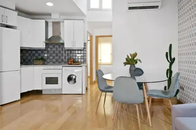 Una cocina o zona de cocina en Gran Vía Green Apartments