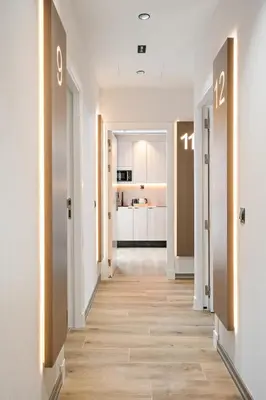 Cama o camas de una habitación en Dobo Madrid Ricardos