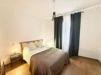 Cama o camas de una habitación en Metro Anton Martin 01 AMCH Hospedaje