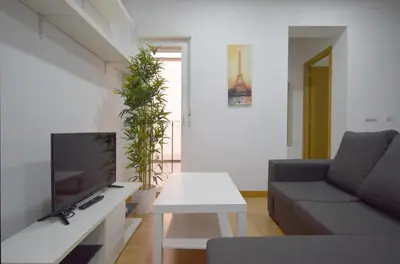 Una televisión o centro de entretenimiento en Apartamento en Fuente del Berro