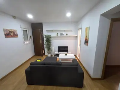 Una televisión o centro de entretenimiento en Apartamento en Fuente del Berro
