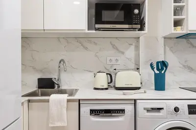 Una cocina o zona de cocina en Waou Malasaña VII - Alquiler Corta Duración