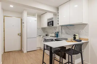 Una cocina o zona de cocina en Waou Malasaña VII - Alquiler Corta Duración