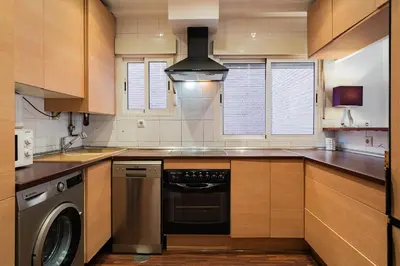 Una cocina o zona de cocina en La Estacion de Tarragona