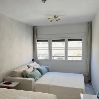 Cama o camas de una habitación en Apartamento Santos II en Recoletos