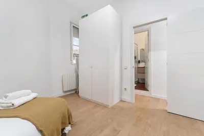 Cama o camas de una habitación en Yellow Lavapies