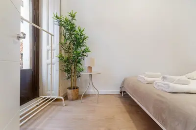 Cama o camas de una habitación en Yellow Lavapies