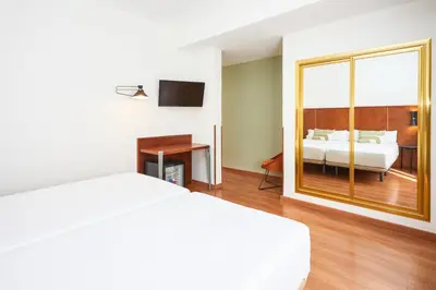 Cama o camas de una habitación en Hotel Casón del Tormes by HappyCulture