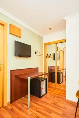 Una televisión o centro de entretenimiento en Hotel Casón del Tormes by HappyCulture