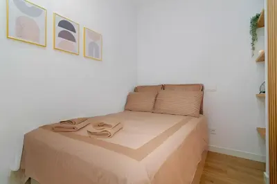 Cama o camas de una habitación en Lavapies Loft culture and design