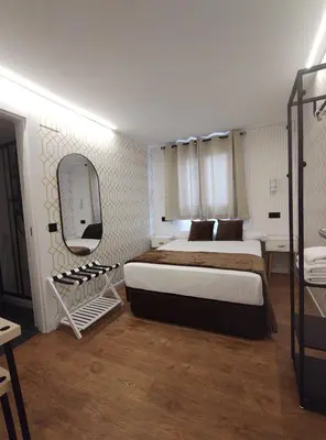 Cama o camas de una habitación en JQ Madrid 2