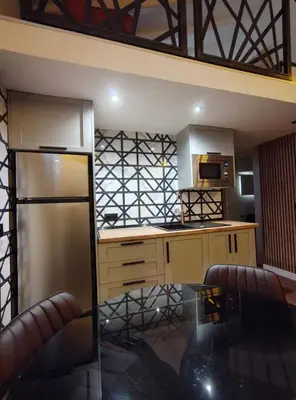 Una cocina o zona de cocina en JQ Madrid 2