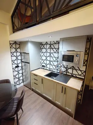 Una cocina o zona de cocina en JQ Madrid 2