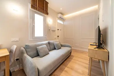 Una televisión o centro de entretenimiento en Y29- New Apartment Madrid Rio