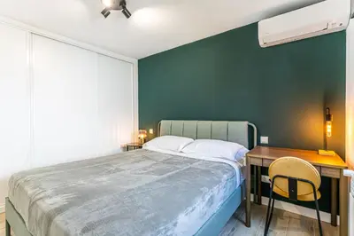 Cama o camas de una habitación en Tu casa con terraza en Madrid